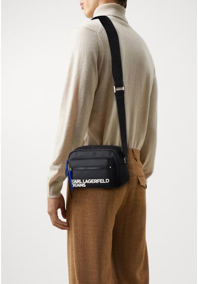 Сумка UTILITY COATED CROSSBODY UNISEX