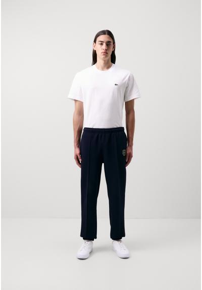 Брюки TENNIS HERITAGE TRACKPANT TENNIS HERITAGE TRACKPANT