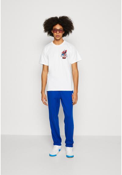 Брюки LACOSTE X NETFLIX UNISEX